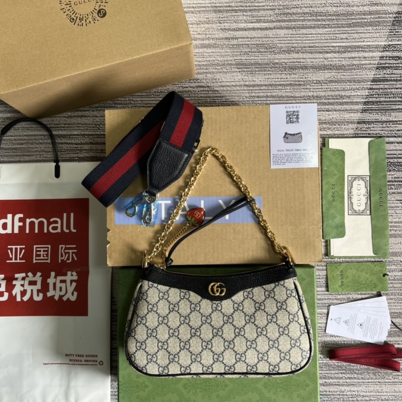 G*u*i top handle bags